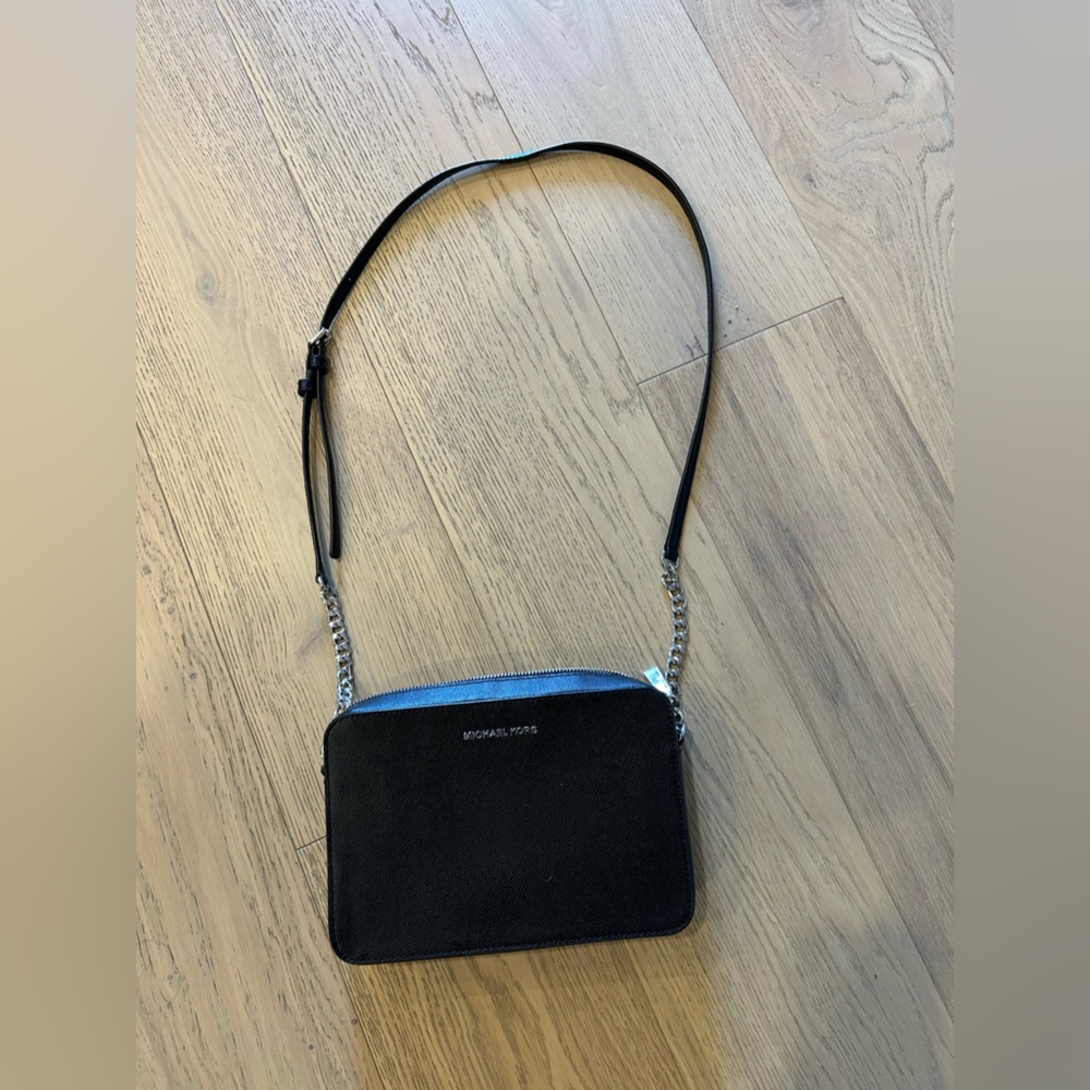 Black and silver Michael Kors cross body purse